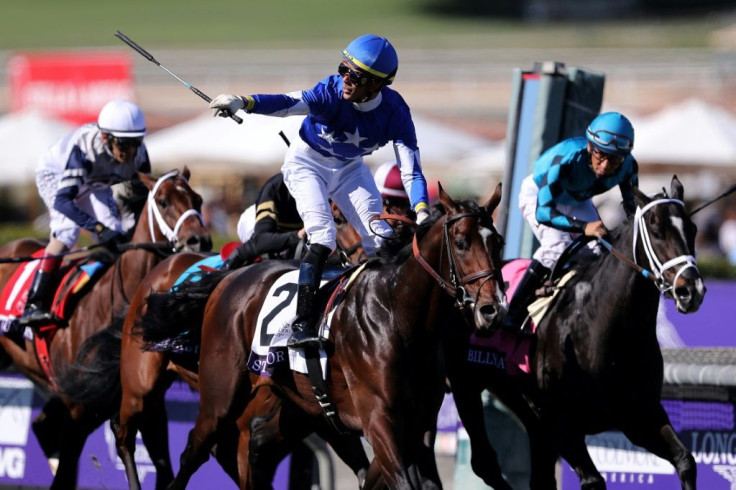 Jockey Jose Ortiz aboard Structor reacts after winning the 2019 Breeders' Cup Juvenile Turf at Santa Anita