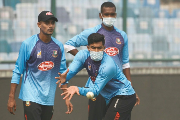 Some Bangladesh players and bowling coach Daniel Vettori trained in masks at the Arun Jaitley stadium where the Twenty20 match is to be played