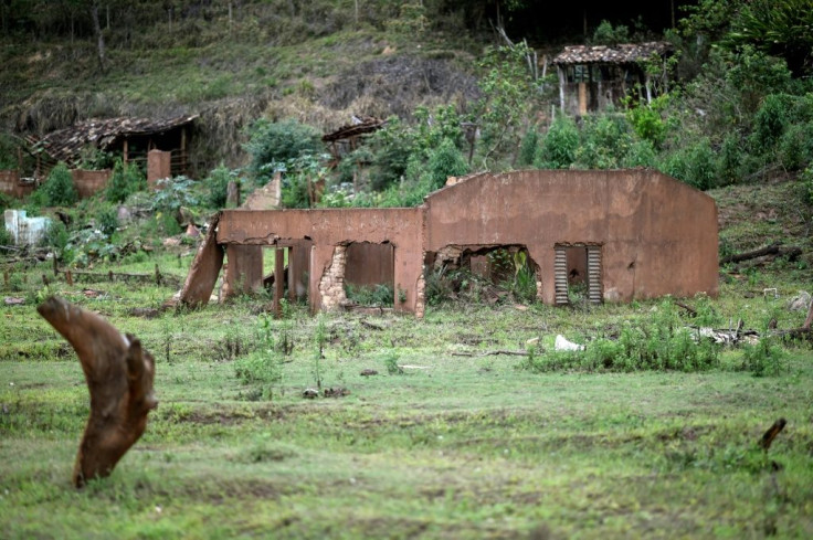 View of the ruins of a house - destroyed by floods following the deadly collapse of the Fundao dam in 2015 - in Paracatu de Baixo village, Mariana district, Minas Gerais state, Brazil, on October 21, 2019