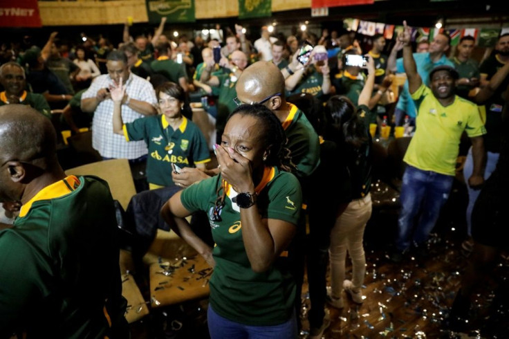 South Africans celebrate in Johannesburg after the Springboks won the Rugby World Cup - rugby has grown in popularity among the black population who traditionally prefer football