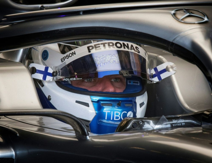 Valtteri Bottas plots his pole position drive in the pits