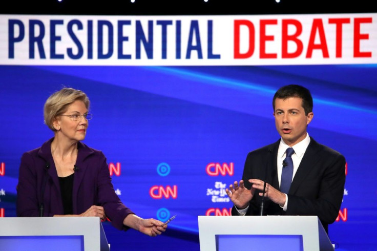 Senator Elizabeth Warren, seen here during a Democratic debate October 15, 2019 alongside South Bend, Indiana Mayor Pete Buttigieg, has surged to a lead in the early caucus state of Iowa