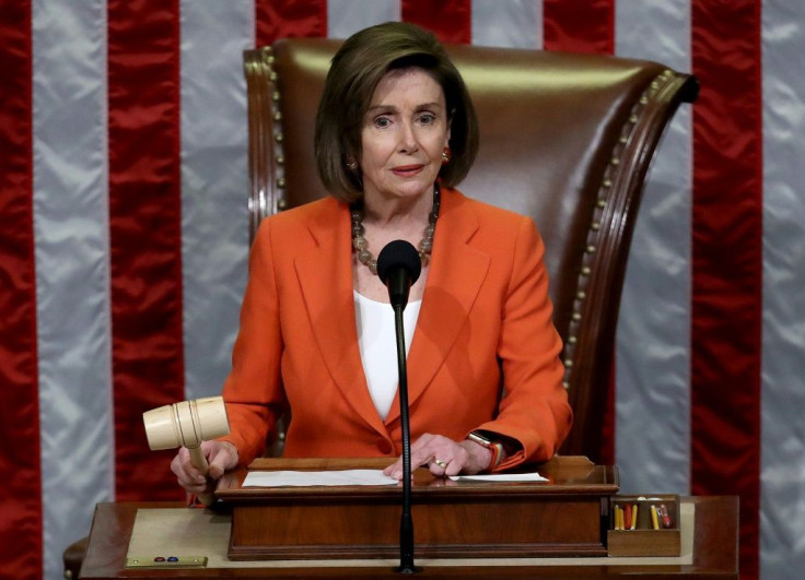 House Speaker Nancy Pelosi is seen on October 31, 2019 in the US Capitol, gaveling to a close a vote to formalize the impeachment inquiry into Donald Trump