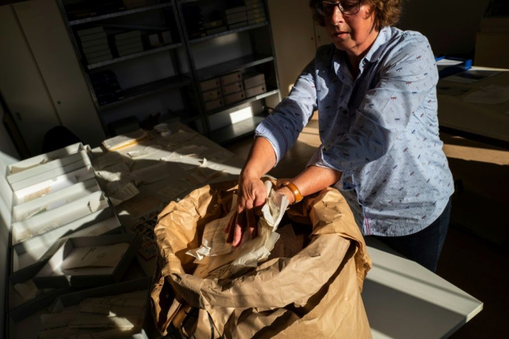 On average it takes each puzzler 18 months to completely reconstruct each sack of shreds