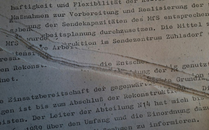 Manual reconstruction of the ripped up papers began in 1995