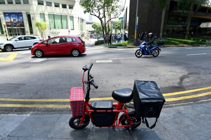 The city-state is the latest country to introduce new regulations to cope with a surge in the popularity of the contraptions