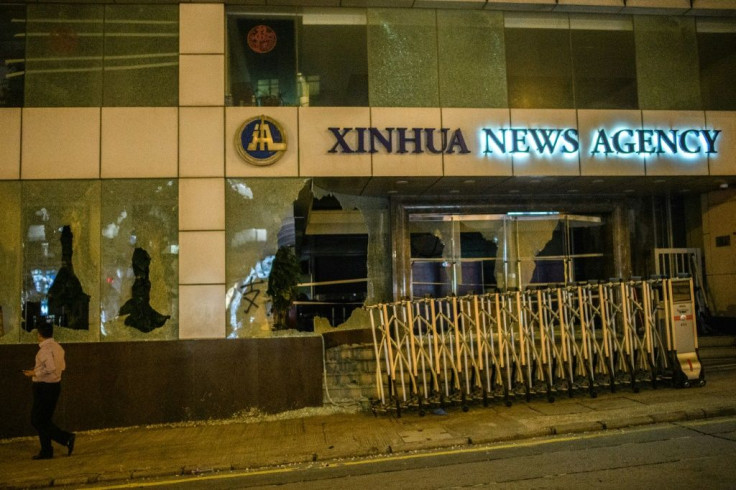 Hardcore demonstrators in Hong Kong smashed the windows of Chinese state-run news agency Xinhua