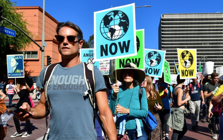 Activists march through downtown Los Angeles in November 2019 in a climate change rally addressed by teenage Swedish activist Greta Thunberg