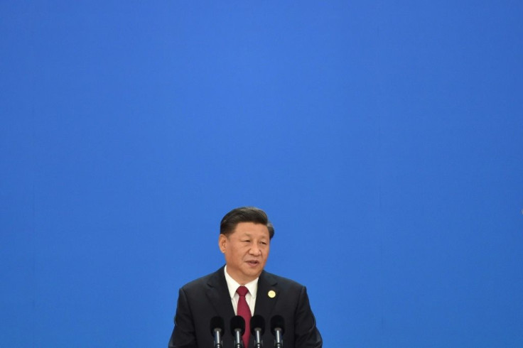 President Xi Jinping called on the world community to 'knock down walls instead of building walls'
