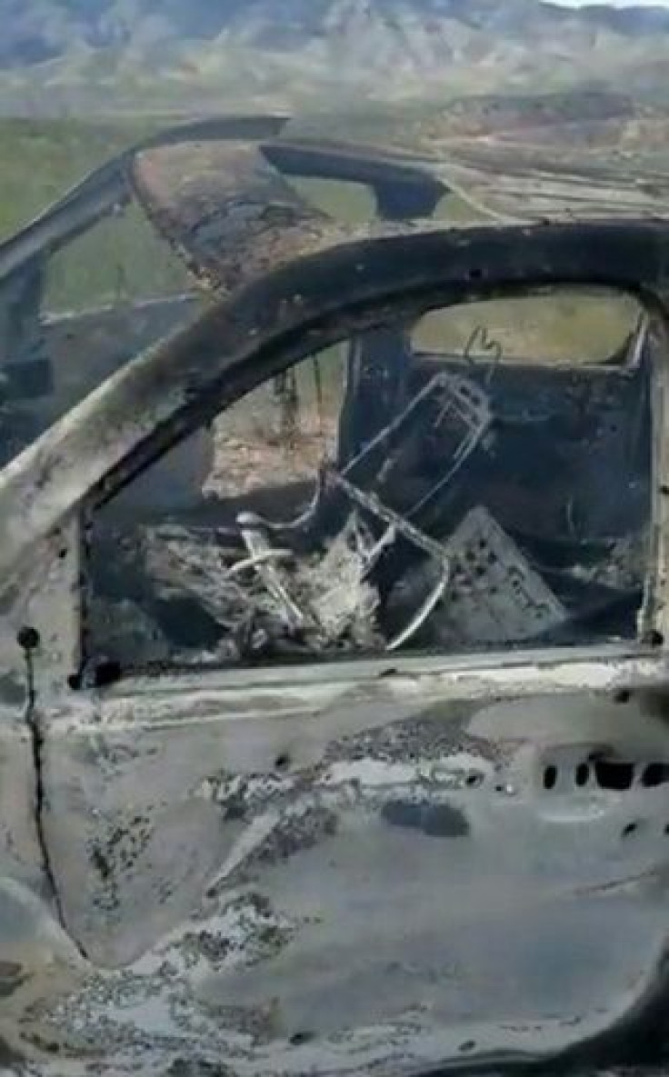 TV grab from a video published by Lebaron's family on social media showing a burnt vehicle that was carrying three women and six children from an American Mormon family near Rancho de la Mora, in northern Mexico, on November 4, 2019