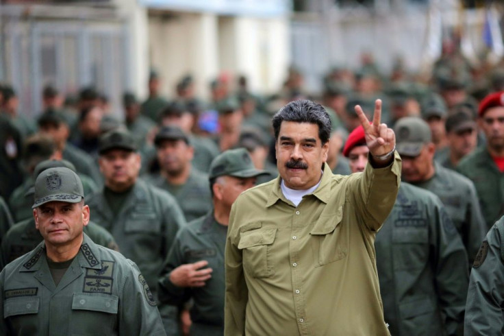 Remigio Ceballos, a senior Venezuelan admiral hit by US sanctions, walks to the left of President Nicolas Maduro during a January 2019 military rally