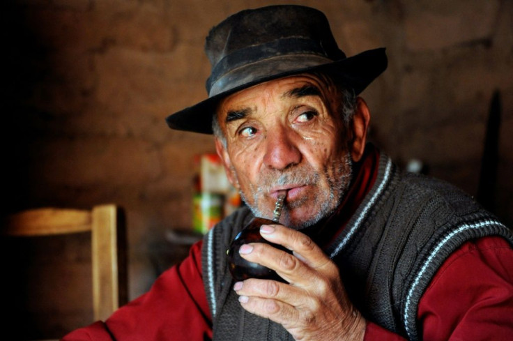 Argentine goat farmer Antonio Sazo drinks "mate", a traditional infusion, in El Alambrado