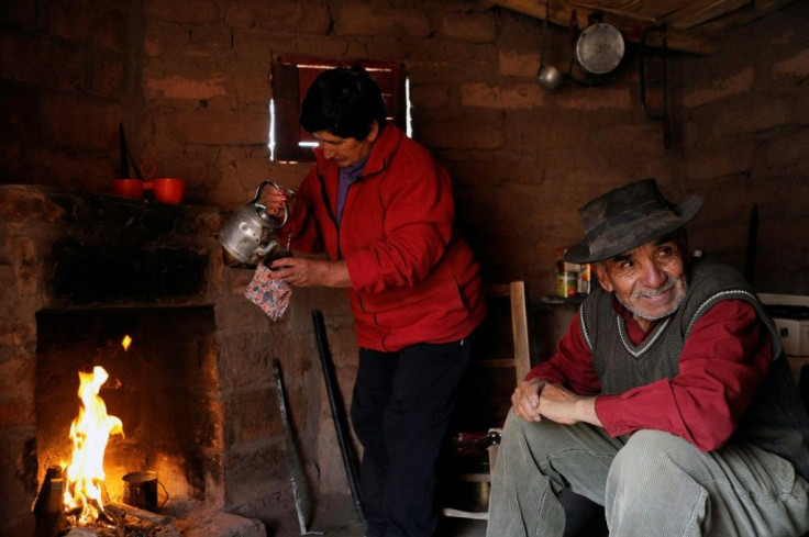 Goat-breeder Antonio Sazo and his wife Rosa drink mate in El Alambrado in the south of Argentina's Mendoza province