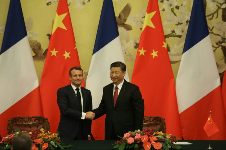 French President Emmanuel Macron and Chinese leader Xi Jinping put on a united front on the Paris climate accord after Washington pulled out