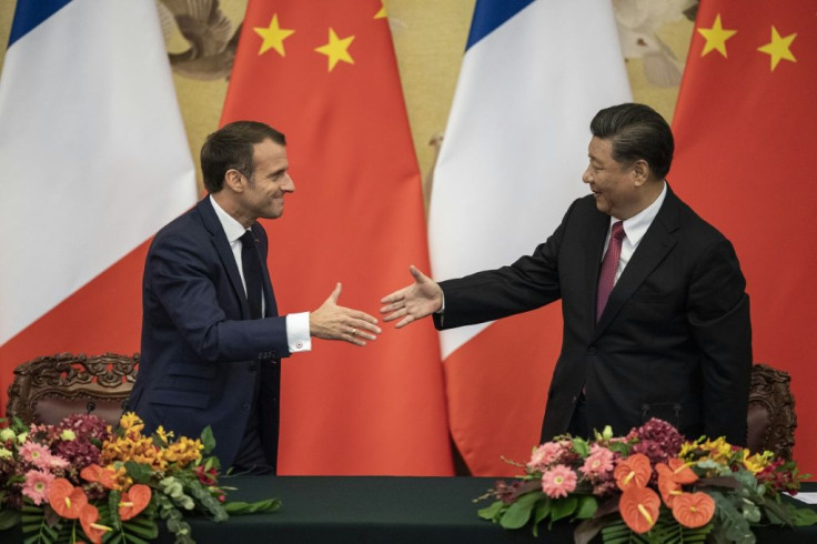 French President Emmanuel Macron and Chinese leader Xi Jinping put on a united front on the Paris climate accord after Washington pulled out