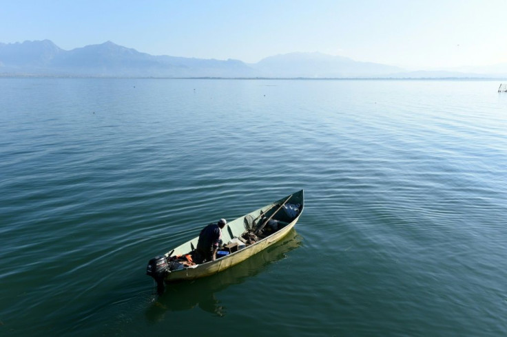 Albanian fishermen and experts are alarmed by overfishing and poaching on the Balkans' biggest lake, Shkodra
