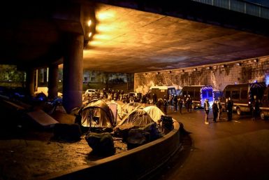 Officials said 1,600 migrants were removed from the makeshift camps set up under the ring road that surrounds Paris.