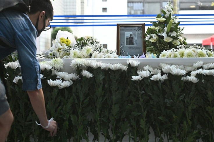 A memorial for Alex Chow, a 22-year-old student who died on Friday after falling from a car park ledge during anti-government protests