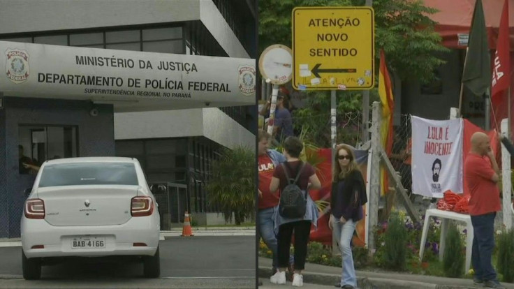 People gather outside of a police station in Curitiba, where former president Luiz Inacio Lula da Silva is detained, waiting for his release, after the Brazil's Supreme Court issued a ruling that could free him