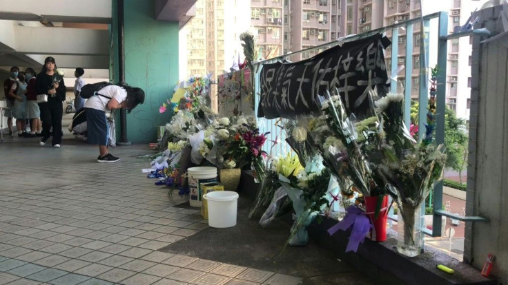 Hong Kongers mourn a student who died from a fall during recent protester clashes with police, triggering fresh outrage from the pro-democracy movement and fears of more violent unrest