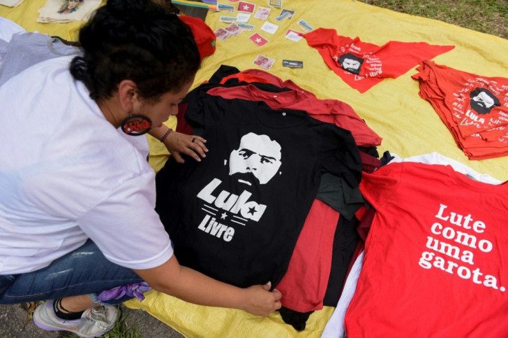 Street vendors offers jerseys urging the release from jail of former Brazilian President Luiz Inacio Lula da Silva; his girlfriend Rosangela da Silva tweeted on November 8, 2019 'I'm coming for you, wait for me'
