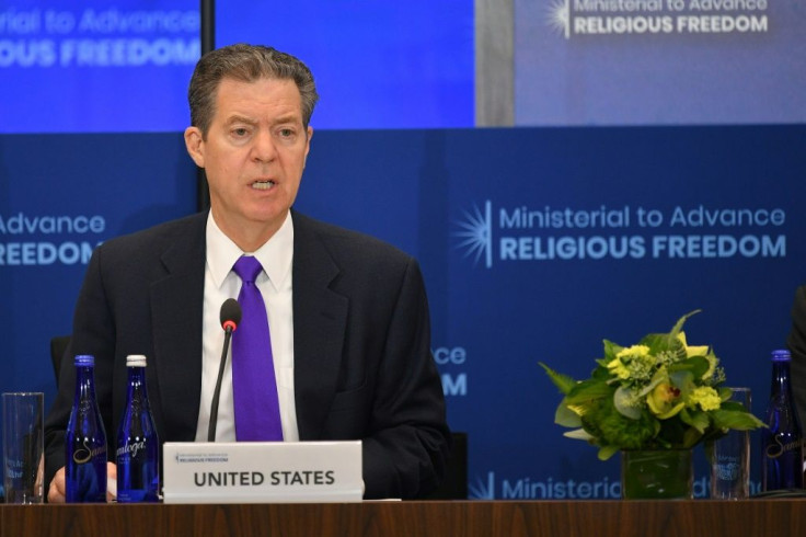 US religious freedom envoy Sam Brownback, seen here at a July 2019 ministerial meeting in Washington, is raising pressure over the Dalai Lama's succession