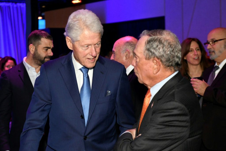 Michael Bloomberg spoke to former US president Bill Clinton at an event in New York on October 29, 2019; the former mayor has been a Republican, an independent and now a Democrat
