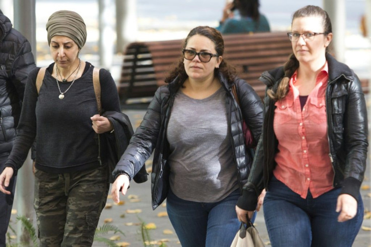 Zeina Abouammo, second left, whose husband, US citizen Ahmad Abouammo, is accused of using his position at Twitter to spy on accounts, arrives for a hearing at US District Court, Western District of Washington in Seattle on November 8, 2019