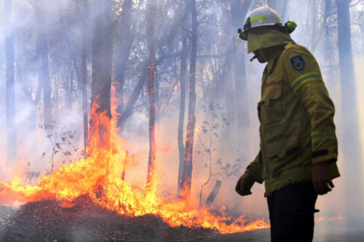 The government says the military could be called on to help some 1,300 firefighters who are tackling around 100 blazes