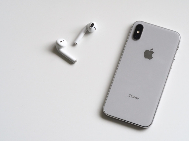 silver-iphone-x-with-airpods-788946