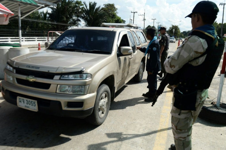 Armed civil defence volunteers and police have been searching vehicles at checkpoints in the southern province of Narathiwat