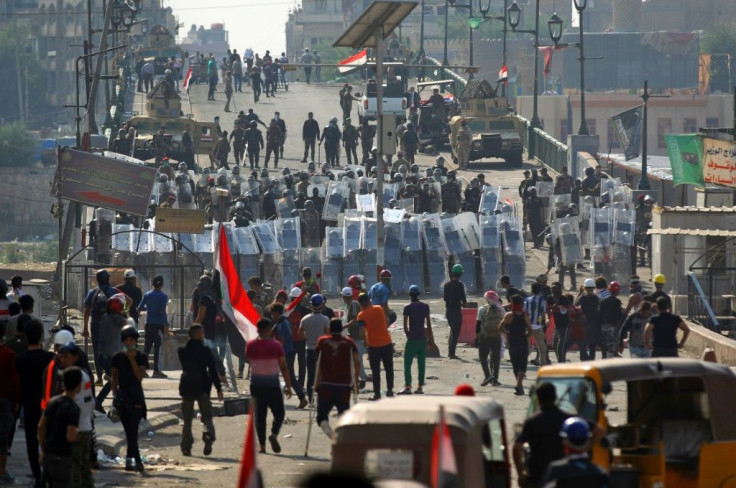Iraqi security forces have battled to prevent the protesters camped out in east Baghdad from overrunning the bridges across the Tigris river that give access to government offices and foreign embassies on the west bank