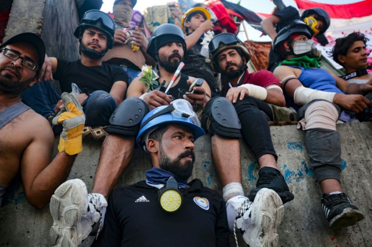 Protesters gather near Baghdad's Al-Jumhuriya (Republic) Bridge, which leads to the high-security Green Zone, where parliament and the British and US embassies are located