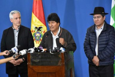 Bolivian President Evo Morales, seen Saturday with Vice-President Alvaro Garcia Linera and Foreign Minister Diego Pary, has not confirmed if he himself will run again