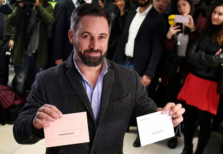Vox's far-right candidate Santiago Abascal poses with his ballots in Madrid as his party looks for a surge in support