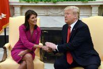 US President Donald Trump shakes hands with Nikki Haley in the Oval Office of the White House on October 9, 2018; she stepped down as UN envoy two months later