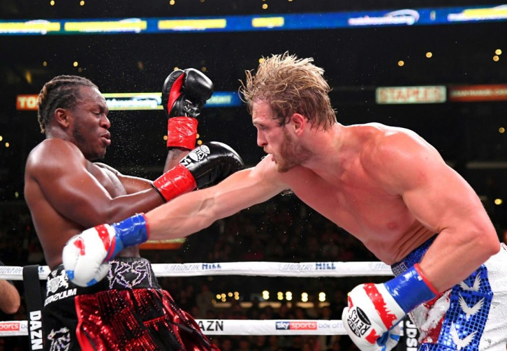 Logan Paul, right, delivers a punch to KSI in their cruiserweight fight Saturday at Los Angeles