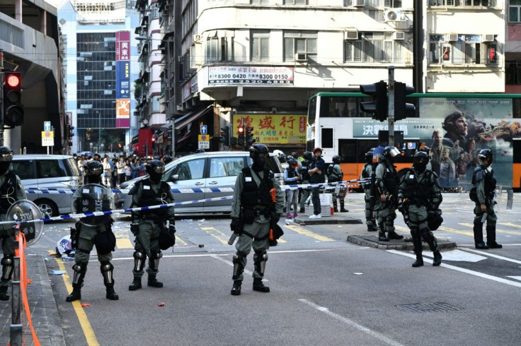Hong Kong police shot a protester on Monday in the latest escalation in the city's political crisis