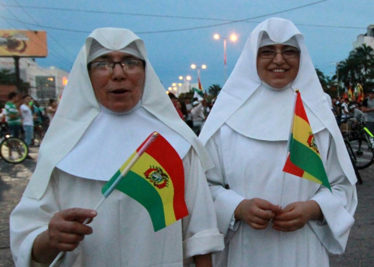 Two nuns celebrate the resignation of Bolivian President Evo Morales