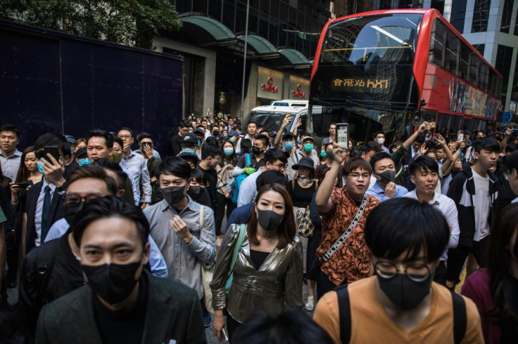 Hong Kong was again rocked by widespread protests, with reports of a man set ablaze after he criticised democracy activists