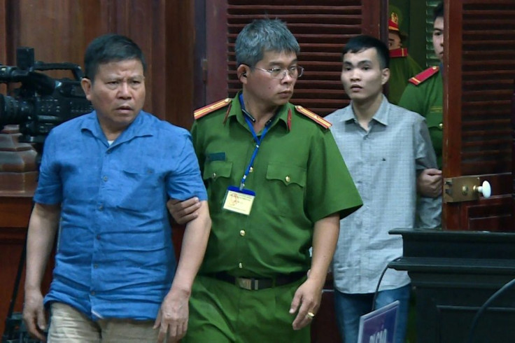 The Vietnam News Agency released a picture of  Australian citizen Chau Van Kham being escorted for trial in Ho Chi Minh City. He was jailed for 12 years on terrorism charges