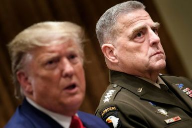 Chairman of the Joint Chiefs of Staff Army General Mark Milley (R) listens while US President Donald Trump speaks before a meeting with senior military leaders; US troop levels in northern Syria will probably stabilize around 500, according to Milley