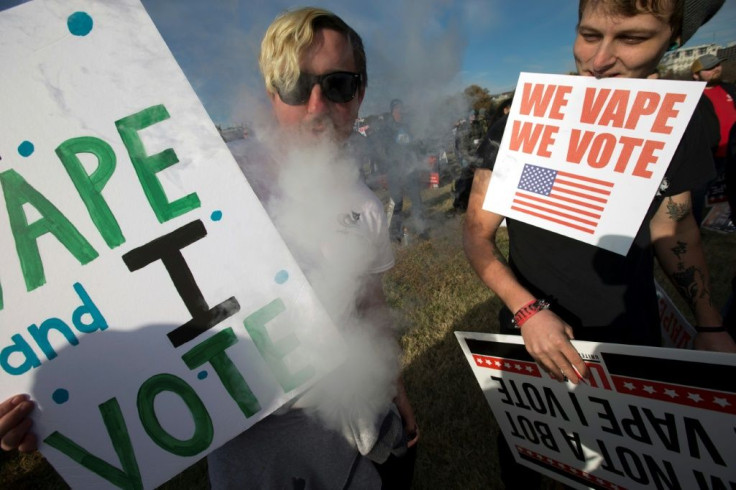 Young people are seen demonstrating on November 9, 2019 outside the White House in opposition to a proposed ban on the flavors used by vapers