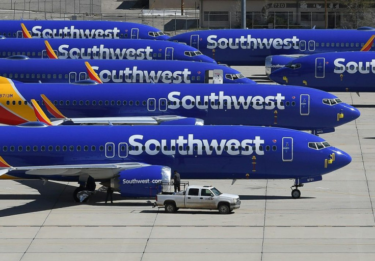 These Southwest Airlines planes, seen on a tarmac in California, were among the Boeing 737 MAX aircraft grounded after two fatal crashes; Boeing now  hopes the model will be cleared to fly in January 2020, while some airlines are aiming for March