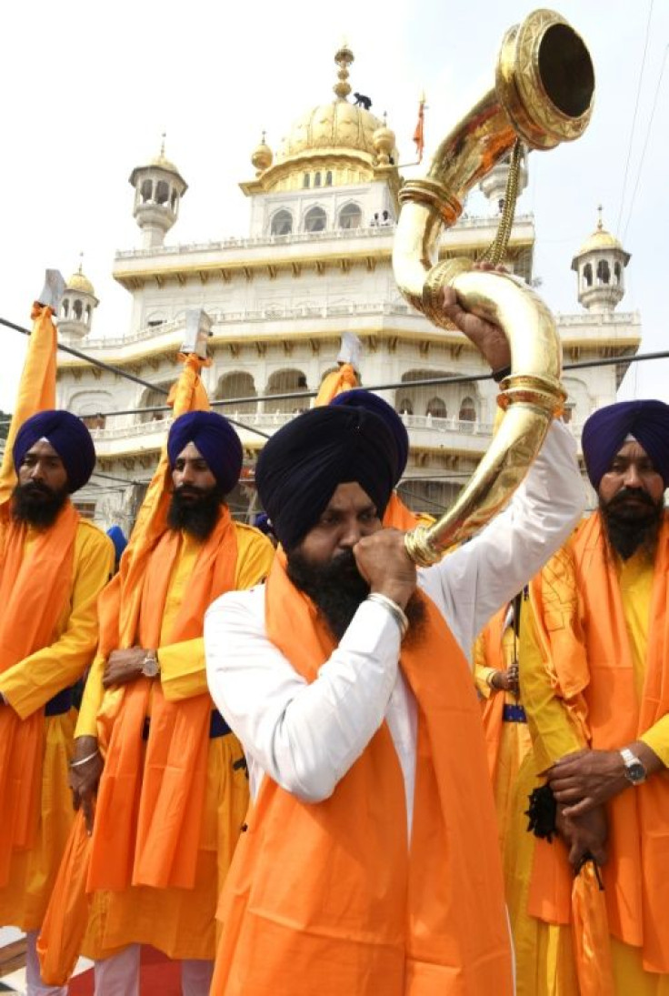 Sikhs around the world come together to sing, pray, eat and hold sprawling processions to mark Guru Nanak's birth