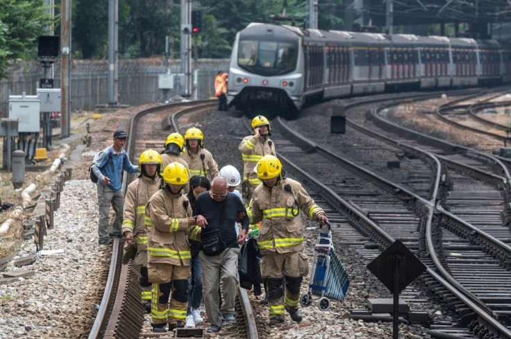 Train services were disrupted when protesters threw objects onto tracks