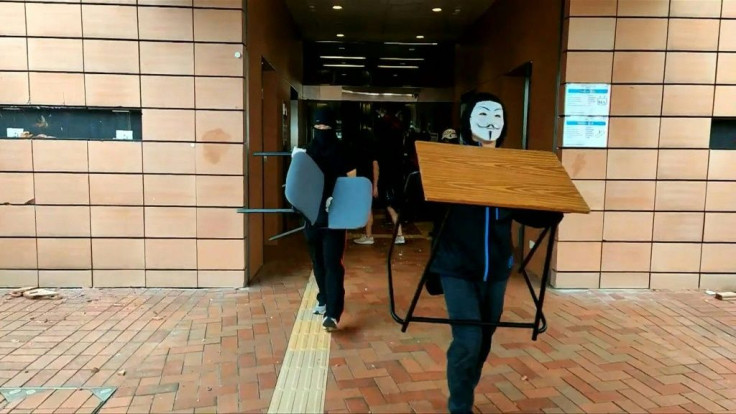 IMAGESPro-democracy protesters gather at the University of Hong Kong and create barricades, a day after demonstrators triggered a city-wide day of action aimed at paralysing the international financial hub.