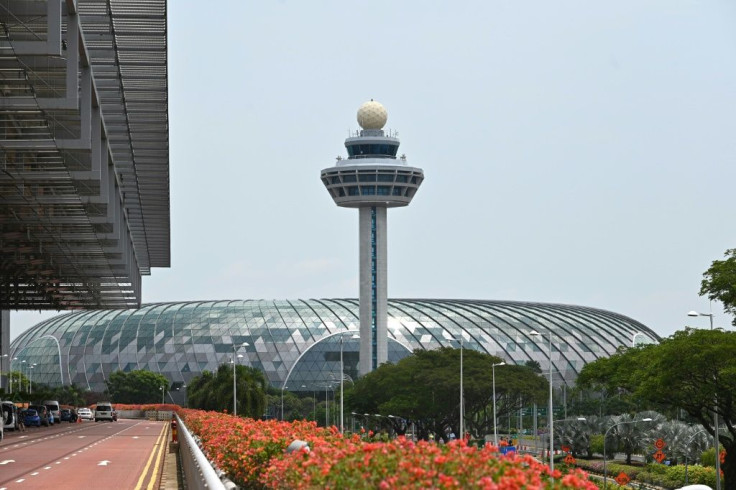 A baggage handler at Singapore's Changi Airport has been jailed after switching the tags on hundreds of pieces of luggage, sending them to wrong destinations around the world