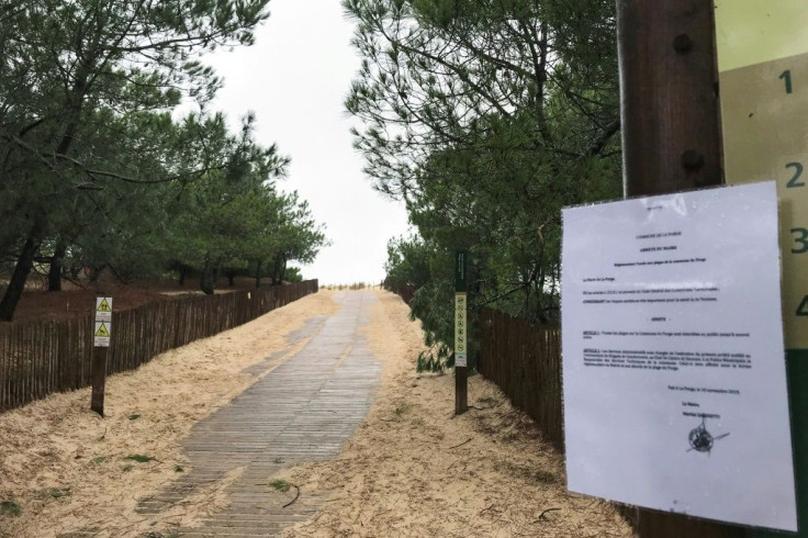 A sign forbidding access to the  Plage du Gressier beach in Le Porge, southwestern France, on Monday, after packages thought to contain cocaine were found there on November 10.