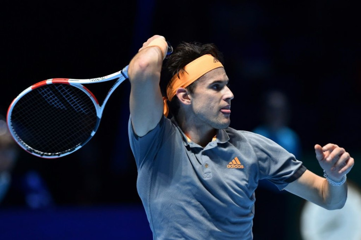 Dominic Thiem in action against Novak Djokovic during their round-robin match at the ATP Finals